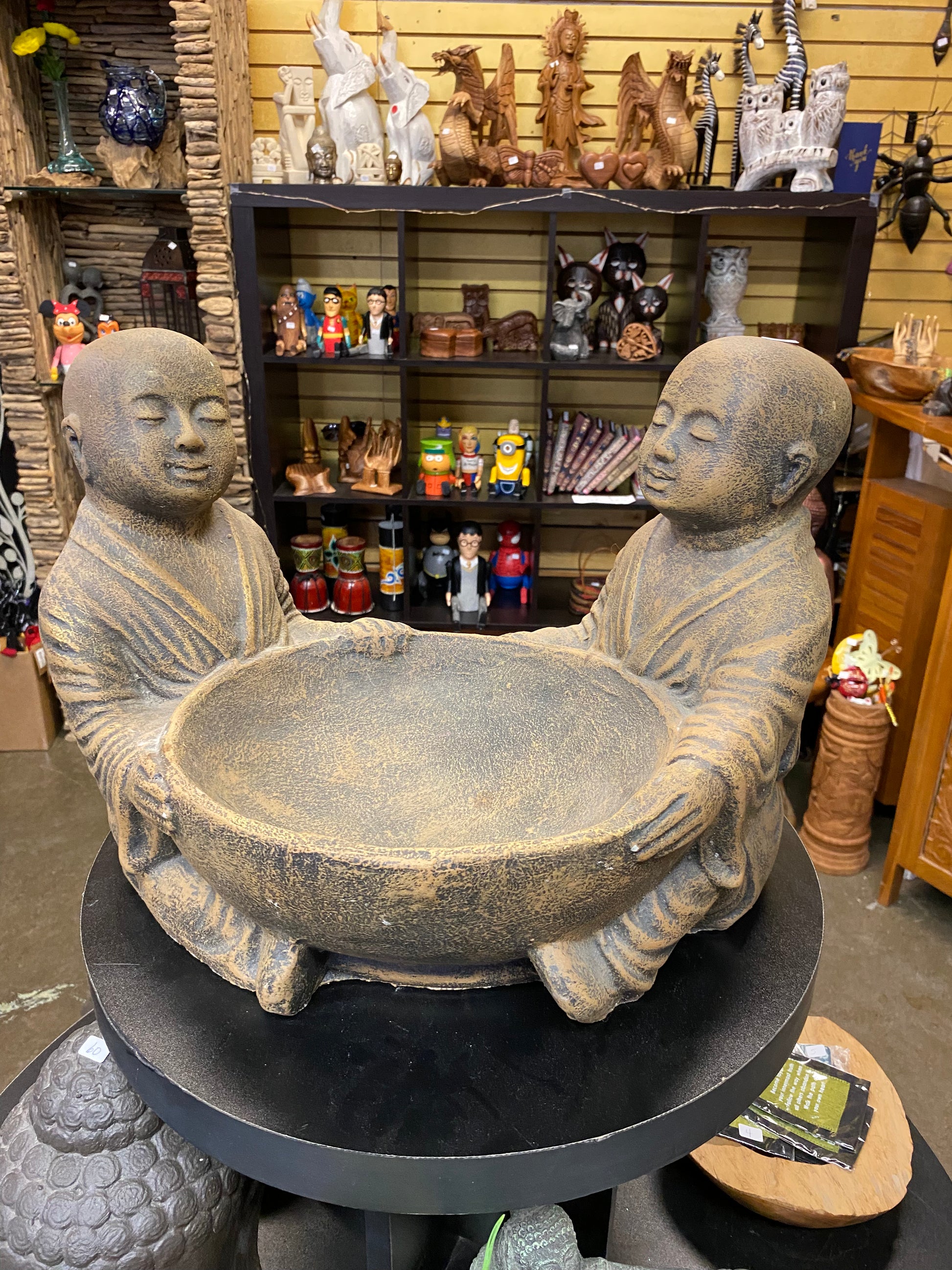 Double monk with bowl statue 